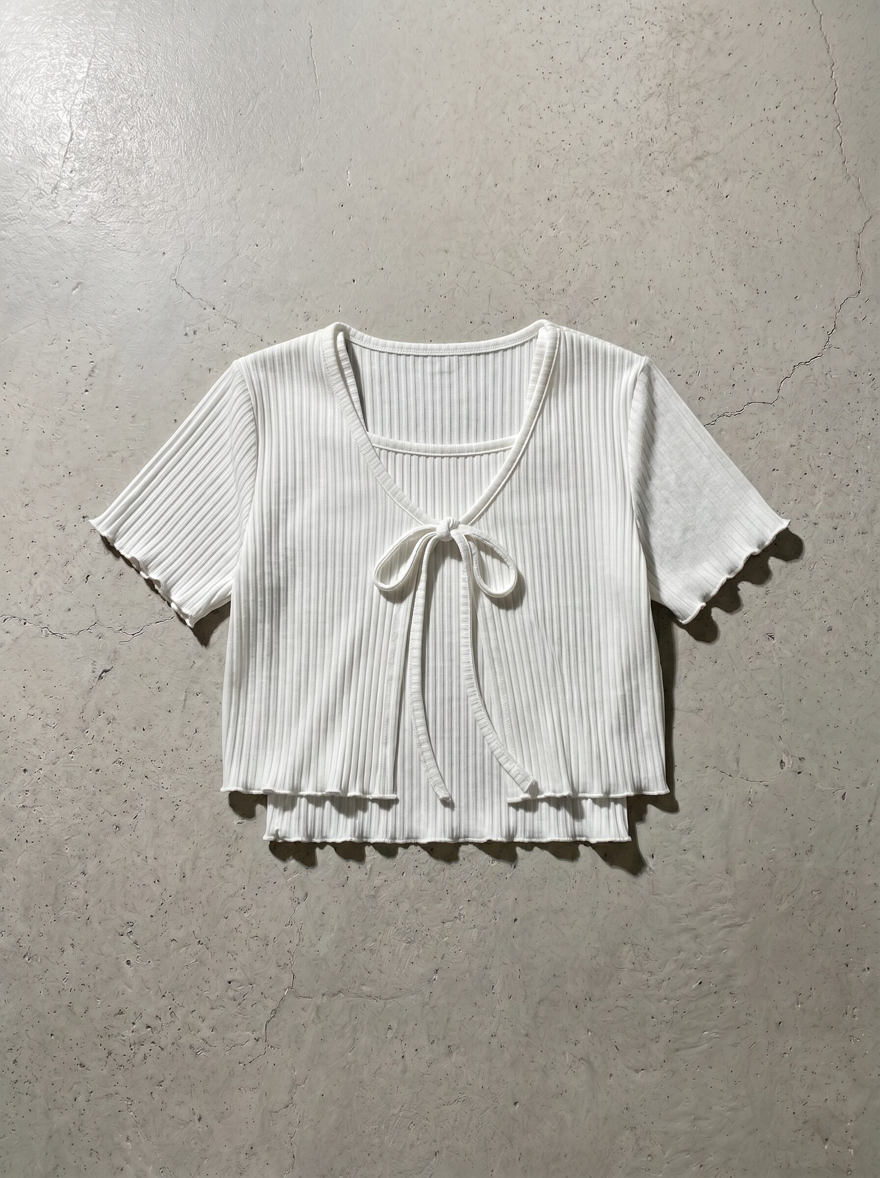 Sleeveless top and cardigan set