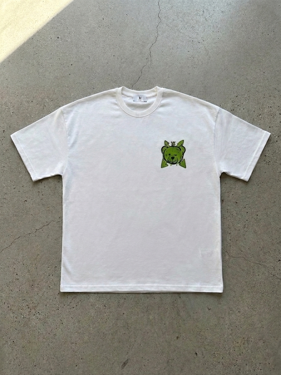 Oversized T-shirt z grafitti z zielonym misiem